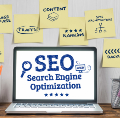 a computer with Search Engine Optimization on it and sticky notes with marketing ideas around it