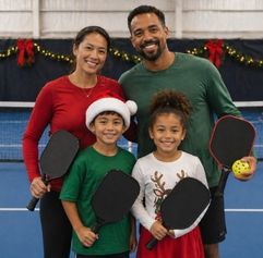 family of pickle ballers wearing holiday attire AI generated image