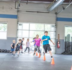 young kids doing a fitness drill