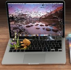 a laptop with a roblox character coming out of it